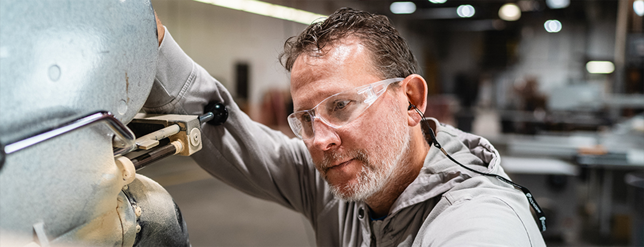 Image of man working in a factory